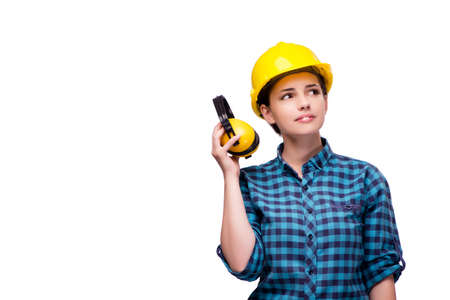 Young woman in industrial concept isolated on whiteの写真素材