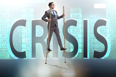 Businessman walking on stilts - standing out from the crowdの写真素材