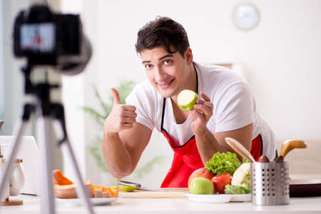 Food blogger working in the kitchenの写真素材