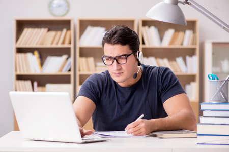 Young freelance worked working on computer
