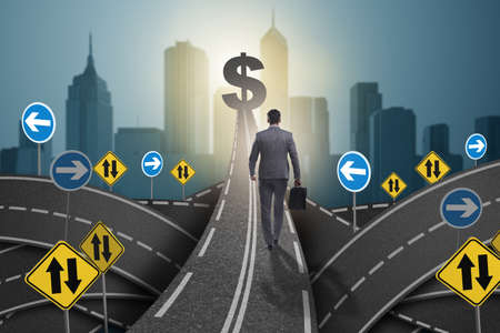 Businessman walking towards his profit targetの写真素材