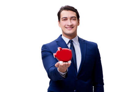 Handsome man with piggybank isolated on whiteの写真素材