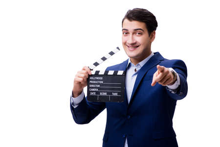 Handsome man with movie clapper isolated on whiteの写真素材