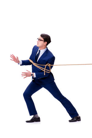 Businessman caught with rope lasso isolated on whiteの写真素材