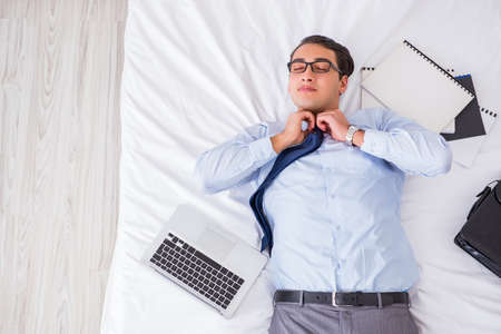 Businessman in the hotel room during travelの写真素材