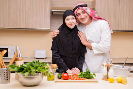 Young arab family in the kitchenの写真素材
