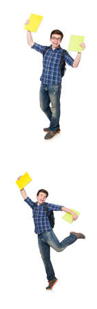 Young student with book on whiteの写真素材