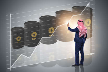 Arab businessman pressing virtual buttonの写真素材