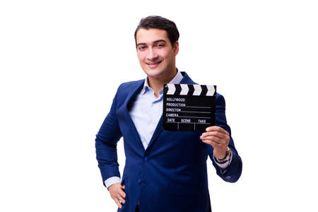 Handsome man with movie clapper isolated on whiteの写真素材