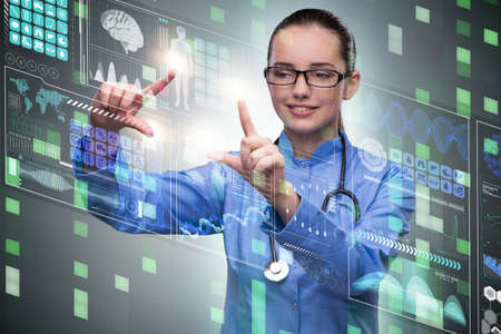 Woman doctor in futuristic medical conceptの写真素材
