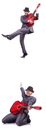 Guitar player isolated on the whiteの写真素材