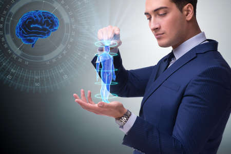 Futuristic remote diagnostics concept with businessmanの写真素材