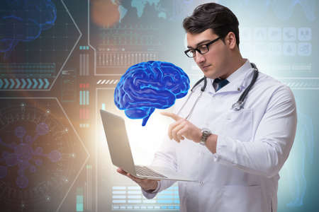 Male doctor with the brain in medical concept