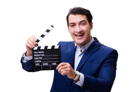 Handsome man with movie clapper isolated on whiteの写真素材
