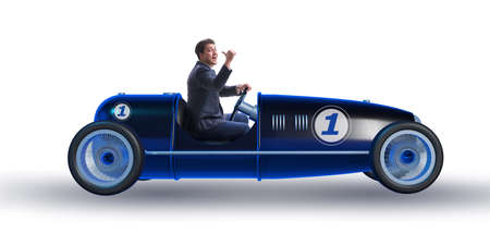 Businessman in vintage roadster isolated on whiteの写真素材