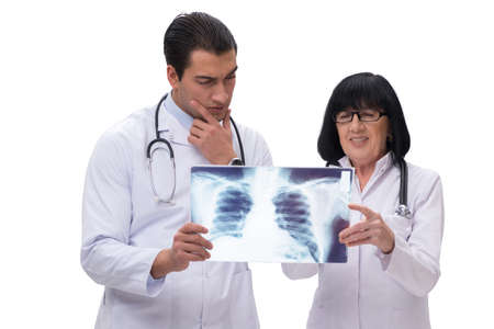 Two doctors looking at x-ray image isolated on white