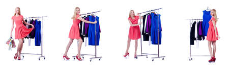 Woman trying new clothing on whiteの写真素材