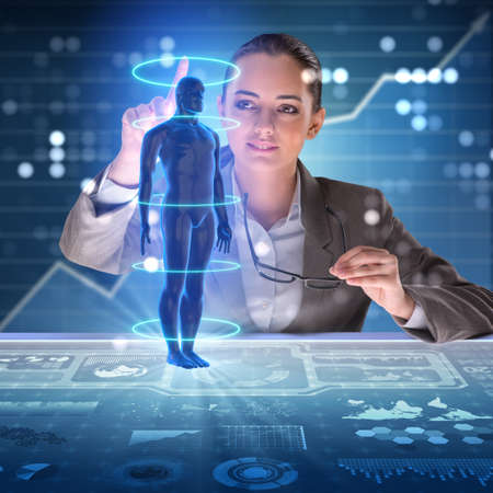 Futuristic remote diagnostics concept with businesswomanの写真素材