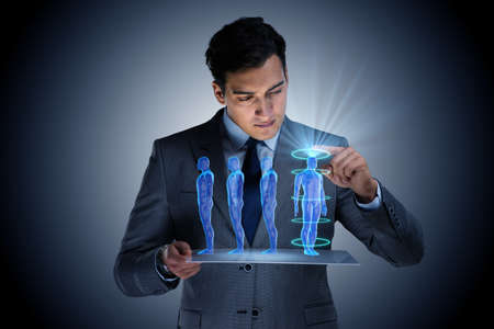 Futuristic remote diagnostics concept with businessmanの写真素材