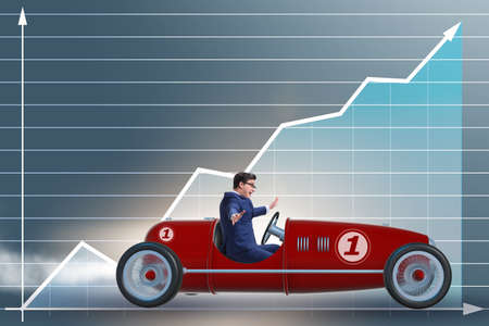 Businessman driving car in financial conceptの写真素材