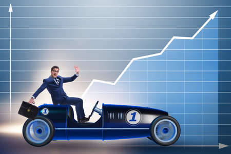 Businessman driving car in financial conceptの写真素材