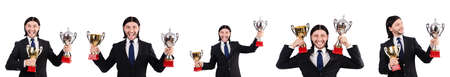 Businessman awarded with prize cup isolated on whiteの写真素材