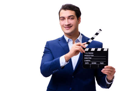 Handsome man with movie clapper isolated on whiteの写真素材
