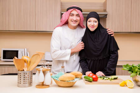 Young arab family in the kitchenの写真素材