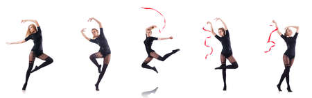 Young woman dancing on white backgroundの写真素材