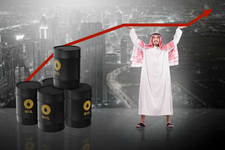 Arab businessman supporting oil priceの写真素材