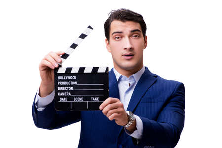 Handsome man with movie clapper isolated on whiteの写真素材