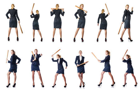 Businesswoman with baseball bat on whiteの写真素材