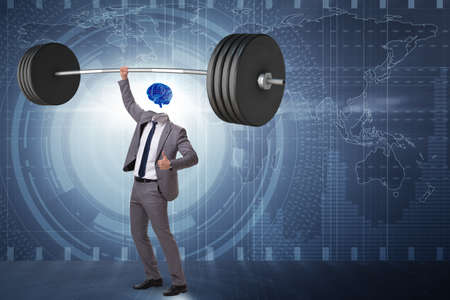 Concept with brain man and dumbbellの写真素材