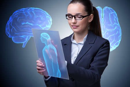 Futuristic remote diagnostics concept with businesswomanの写真素材