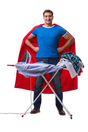 Super hero man husband ironing isolated on whiteの写真素材