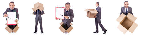 Businessman standing in the box isolated on whiteの写真素材