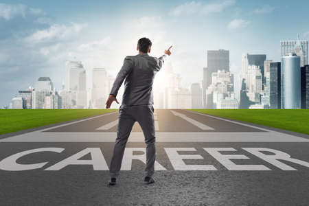 Businessman walking towards his career aspirationsの写真素材
