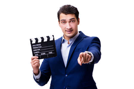 Handsome man with movie clapper isolated on whiteの写真素材