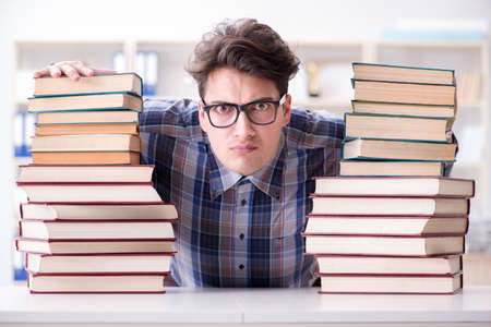 Nerd funny student preparing for university examsの写真素材