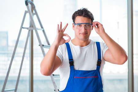 Young worker with safety goggles