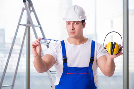 Young worker with noise cancelling headphones