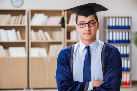 Young man graduating from universityの写真素材
