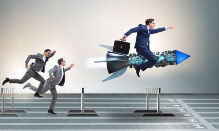 Competition concept with businessman and rocketの写真素材