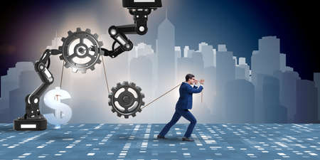 Businessman pulling mechanism and raising dollarの写真素材