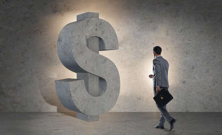 Businessman in financial concept with american dollarの写真素材