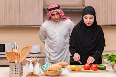 Young arab family in the kitchenの写真素材