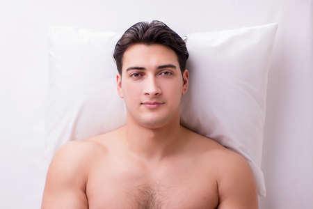 Handsome man in spa massage conceptの写真素材