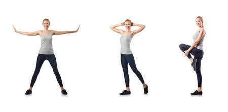 Young woman doing sports isolated on whiteの写真素材