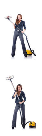 Woman cleaning with vacuum cleanerの写真素材