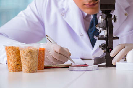 Nutrition expert testing food products in labの写真素材